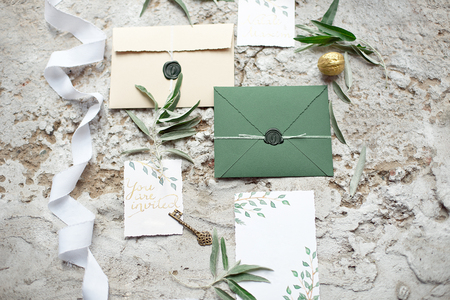 Wedding invitation as a decorated letter in an envelope in the style of boho.の写真素材