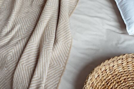 Winter mood, festive decoration of the bed in the bedroom. Christmas decor Still life details in the home interior.の写真素材