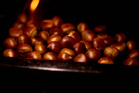Chestnuts, maroni roasted chestnuts, popular autumn street food in Europeの写真素材