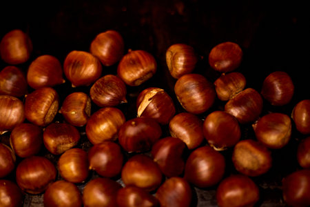 Chestnuts, maroni roasted chestnuts, popular autumn street food in Europeの写真素材