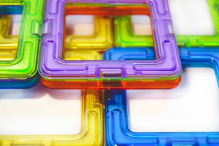 Bright colorful magnetic constructor details for children, toys for children. Educational toys for...