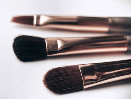 Make-up brushes on a white background. Front view. Beauty concept. Makeup template. Application in the fashion and beauty industry.の写真素材