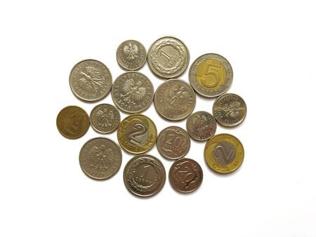 Polish zloty coins on white background.Close up photography.の写真素材