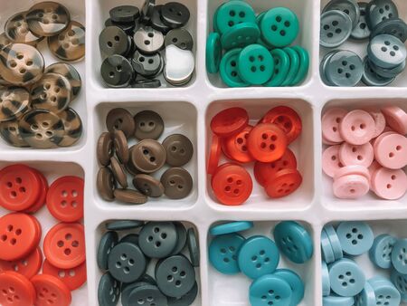 Set of buttons of different colors. Sewing accessories.