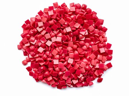 Set of red diamonds for diamond embroidery isolated on white background. Hobbies and DIY, materials for creating diamond embroidery.の写真素材