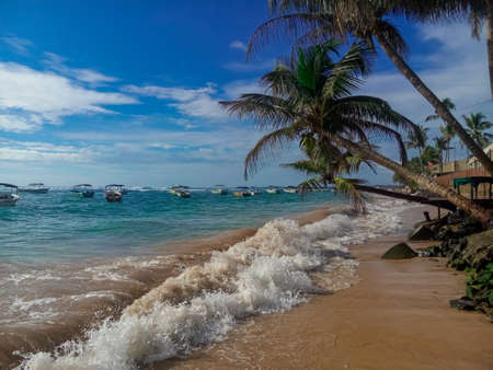 Sea view off the coast of the Indian Ocean in Hikkaduwa, Sri Lanka. The concept of leisure and tourism.の写真素材