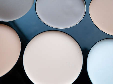 Close-up of contouring for makeup, a set of concealers in various colors. Beauty concept.の写真素材