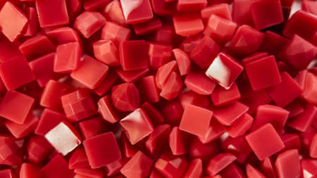 Close-up, red square diamonds for diamond embroidery. Hobbies and DIY, materials for creating diamond embroideryの写真素材