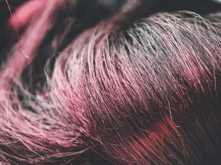 Close-up of trending strands of kanekalon false hair in reddish colorの写真素材