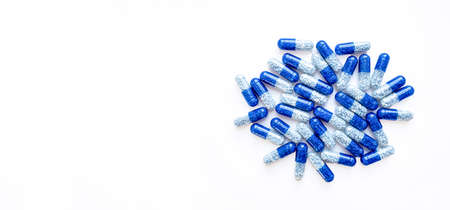 Selective focus, group of blue medical pills isolated on white background.Health and medicine...