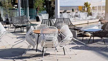 Summer terrace of the restaurant on a clear day. Table near the restaurant close-up