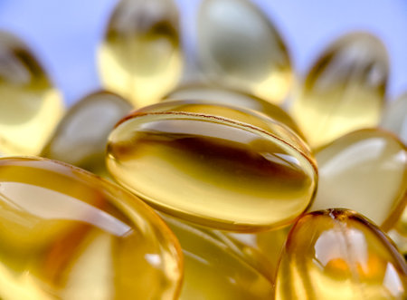 Close-up omega-3 capsules. Polyunsaturated fatty acids. The concept of a healthy lifestyle. Great for magazines and websites in the style of healthy, as well as in medicineの写真素材