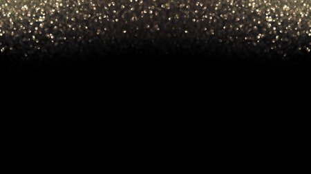 Defocused sparkling golden shimmer lights bokeh border on black background with copy space.の写真素材