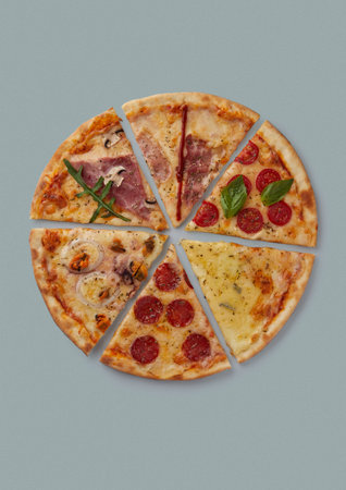 close-up on a gray background six slices with different flavors pepperoni jalapeno cheese Dorblu four cheeses pizza for a large company shank and greens shape of a whole pizzaの写真素材
