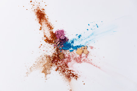 An Artistic Display of Colorful Cosmetic Powders Arranged on a White Background for a Creative Beauty Concept and Make-up Inspirationの写真素材