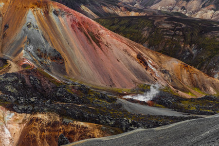 Stunning Geological Features of Volcanic Mountains Captured in a Breathtaking Landscape with Vibrant Colors and Natural Symmetry in a Natural Settingの写真素材