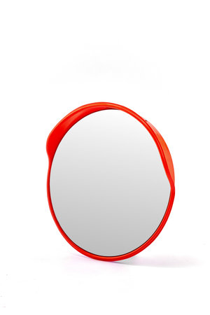 Stylish Round Wall Mirror with Vibrant Red Frame for Modern Home Decor and Fashionable Interiorsの写真素材