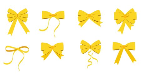 Gold bow set. Cartoon vector yellow ribbons satin bows for xmas gifts, present cards and luxury wrap pack isolated on white backgroundのイラスト素材
