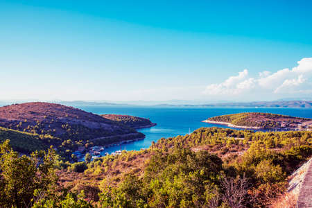 Beautiful aerial view of a bay, islands and clear blue sea. Hvar island, Croatia.