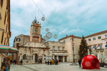 Zadar Croatia - 24 December 2020: Peoples square in Zadar decorated for Christmas with walking people.のeditorial素材