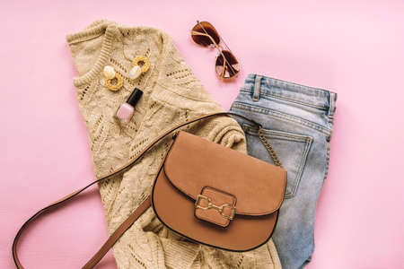 Womens fashion flat lay with beautiful stylish clothes and accessories on pink background. Top viewの写真素材