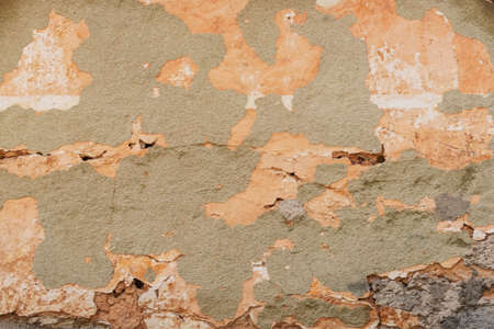 Old plastered wall with cracked paint. Background, texture.の写真素材