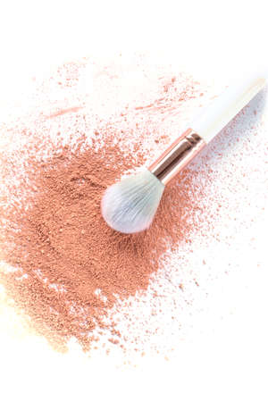 Make up brush with sprinkled powder isolated on white background. Top view, flat lay.の写真素材