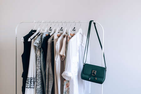 Rack with stylish women's summer clothes. Concept for shopping store, beauty, fashion.の写真素材