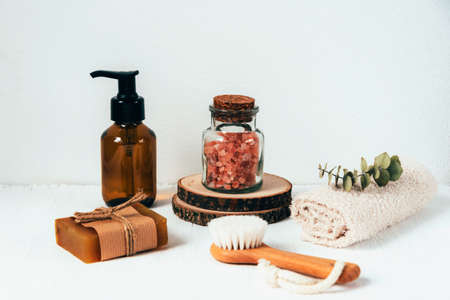 Bath accessories and natural cosmetics, himalayan pink salt in glass jar on white background. Zero waste conceptの写真素材