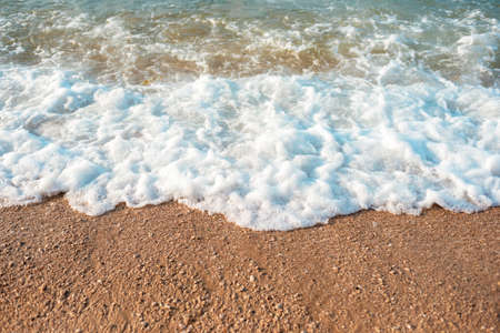 Sea foam on the beach, top viewの写真素材