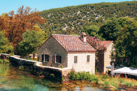 Traditional village house at Krka waterfalls National Park, Croatia.の写真素材