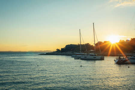 Beautiful sunset by the sea. Murter island, Croatia.の写真素材