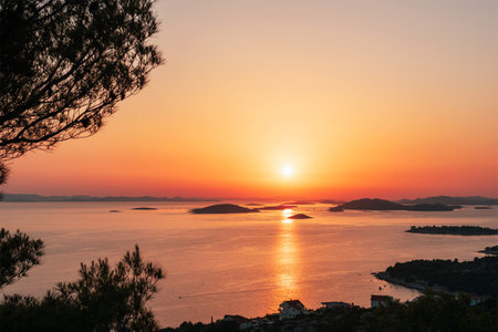 Scenic orange sunset on the sea, Adriatic, Croatia.の写真素材