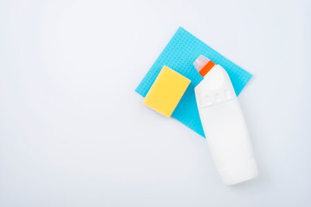 Home cleaning concept, housecleaning, hygiene, chores, cleaning supplies. Cleaning agent, blue rag...