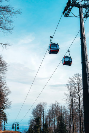 Cable car, funicular in the mountains. Cableway cabin for people transportation to the top of the mountain.の写真素材