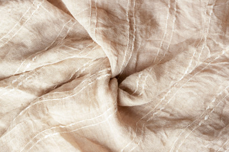 Beige cotton fabric texture. Coarse twisted fabric, background.の写真素材