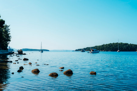Beautiful seascape with boats, yachts and islands in the background. Rab island, Croatiaの写真素材