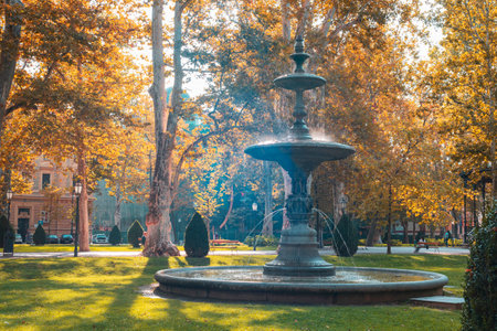 Fountain in city park in autumn. Zagreb, Croatia.の写真素材