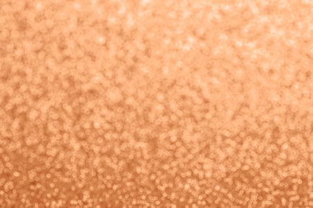 Abstract defocused glitter texture, background. Color of the year 2024 - Peach Fuzz. Copy space.の写真素材