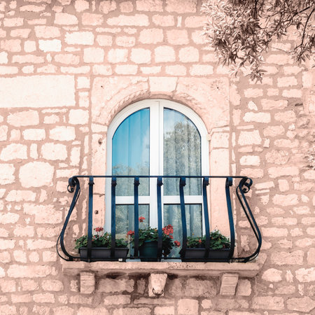 Window and balcony, beautiful old architecture.の写真素材