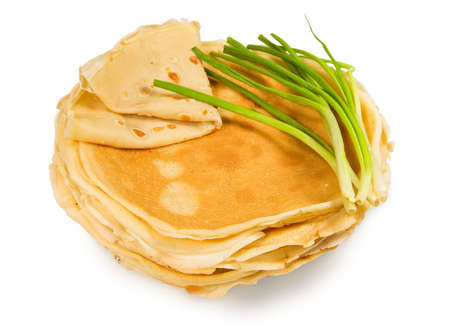 Homemade pancakes with green onions on a white backgroundの写真素材