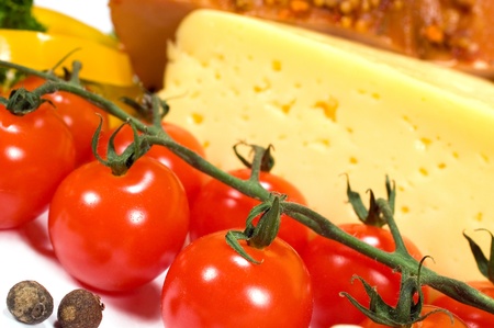 background with cherry tomatoes, cheese and hamの写真素材