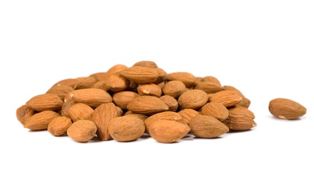 bunch of peeled almonds on a white backgroundの写真素材