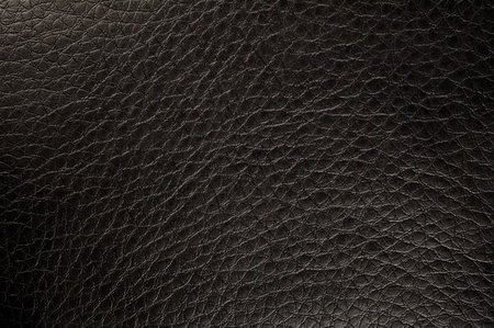 background with a textured black leather close upの写真素材
