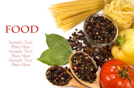 raw vegetables, spices and pasta on a white backgroundの写真素材