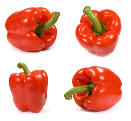 set of red peppers in different angles on a white backgroundの写真素材