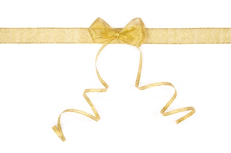 golden ribbon and bow isolated on white backgroundの写真素材