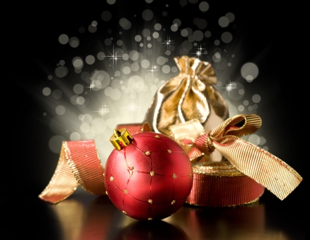 Christmas still life with Christmas decorations, ribbon and giftの写真素材