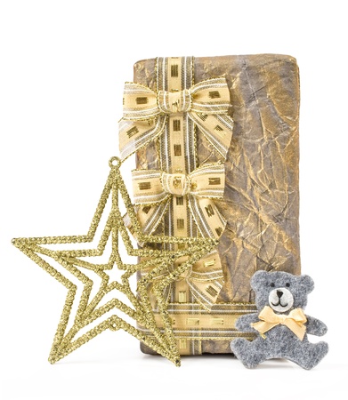 Christmas gift box with decoration isolated on whiteの写真素材