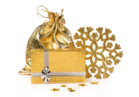 Christmas golden gifts and decorations isolated on whiteの写真素材